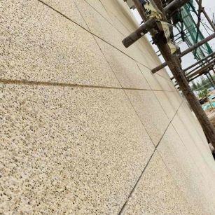 河南 黄金麻花岗岩荔枝面外墙干挂石材效果示例