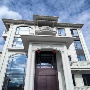 河南白麻别墅外墙干挂石材效果示例