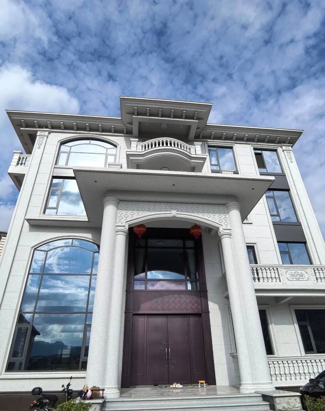 河南白麻别墅外墙干挂石材效果示例