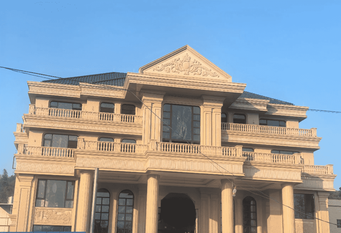 河南黄金麻别墅外墙干挂石材效果示例